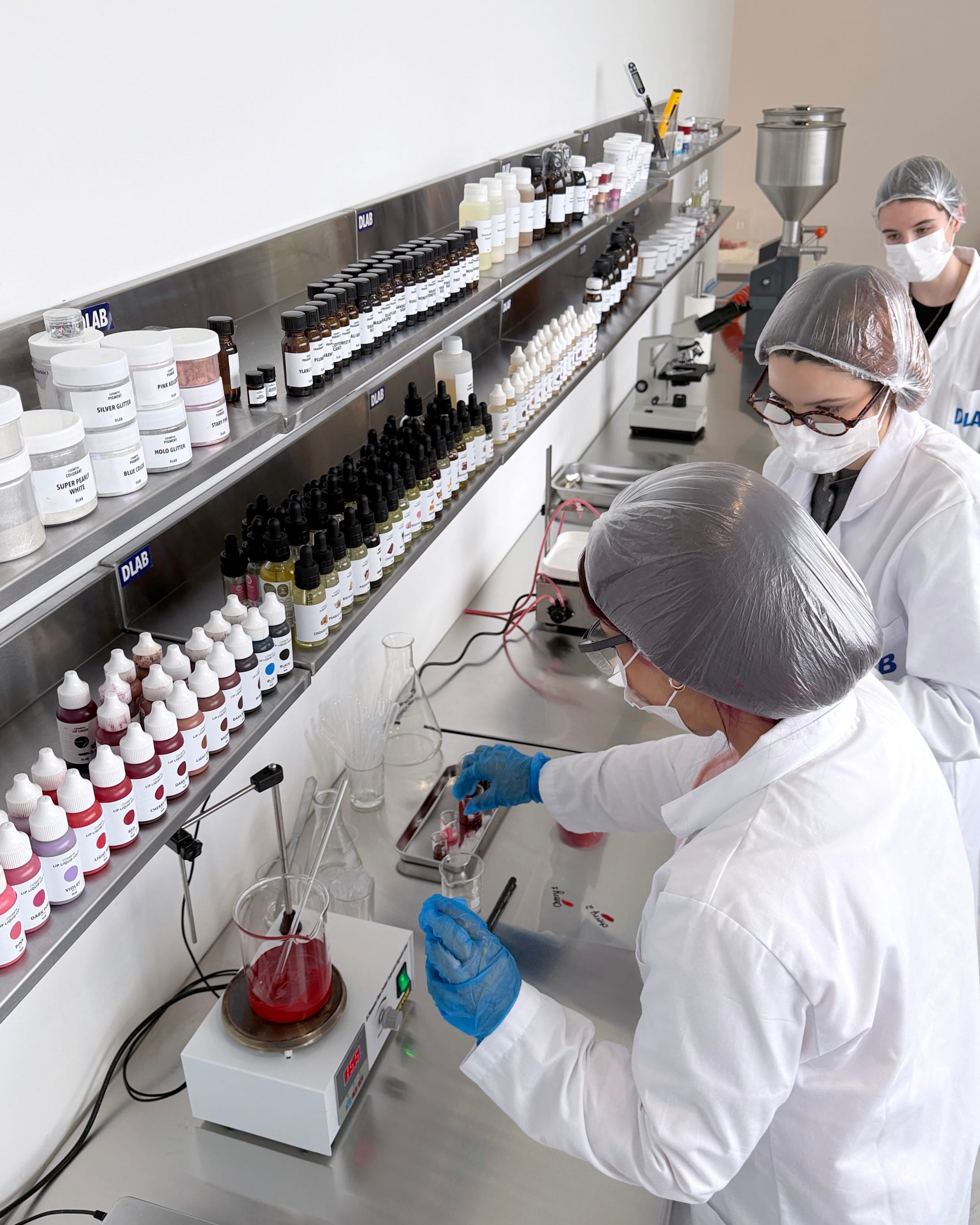 skincare and lip gloss production in cosmetics laboratory